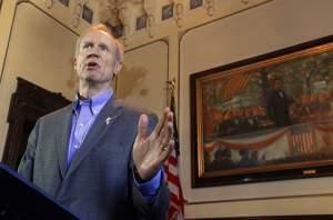 Illinois Gov. Bruce Rauner speaks to reporters in his office at the Illinois State Capitol Wednesday, June 15, 2016, in Springfield.