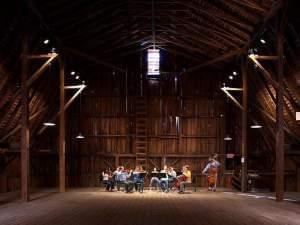 band performing in barn