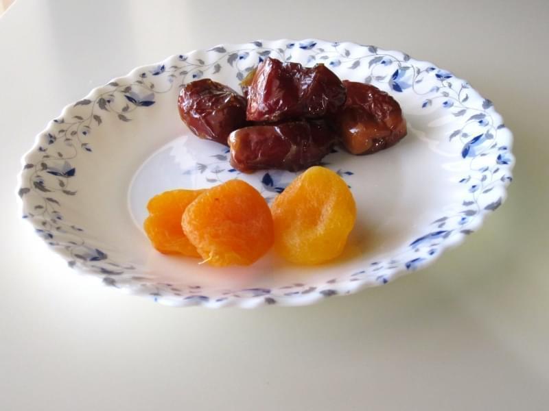 A plate of dates and dried apricots