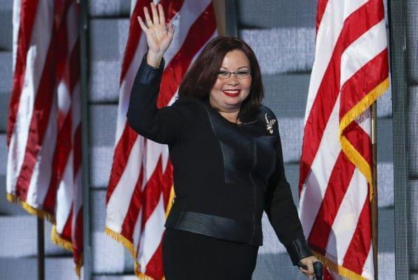 Rep. Tammy Duckworth, D-Ill., waves to delegates during the final day of the Democratic National Convention in Philadelphia, Thursday, July 28, 2016.