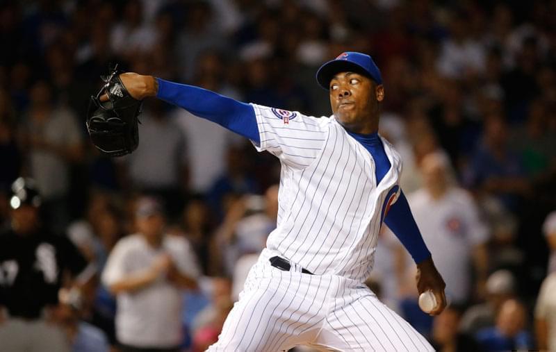 Chicago Cubs relief pitcher Aroldis Chapman delivers during the ninth inning of a baseball game against the Chicago White Sox in Chicago.