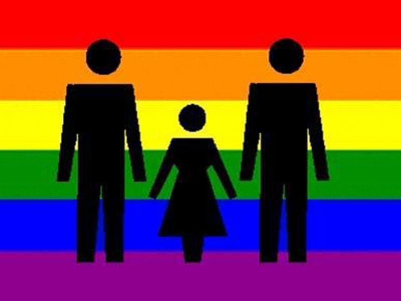 Pride flag superimposed with two male stick figures and one of a child