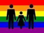 Pride flag superimposed with two male stick figures and one of a child