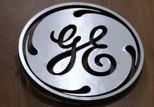  In this Thursday, Jan. 16, 2014, file photo, a General Electric logo is displayed at a store in Cranberry Township, Pa.