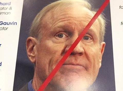 Anti-Rauner poster seen on Democrats Day at the Illinois State Fair.
