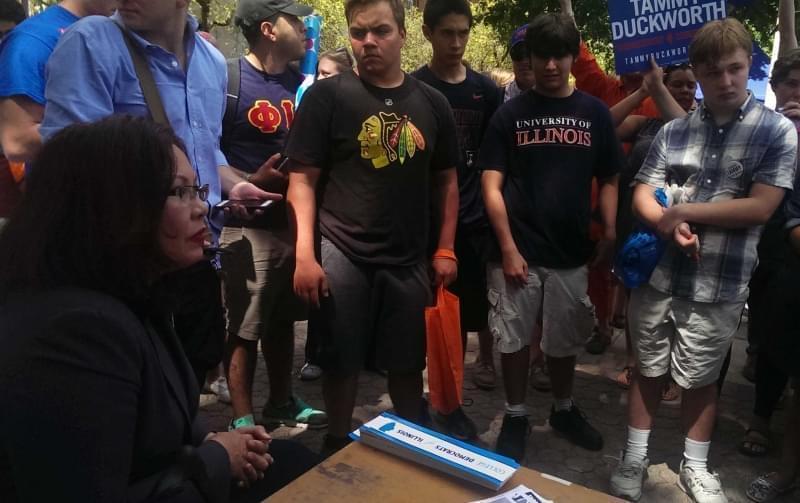 Tammy Duckworth addresses students at the the Democrats booth at University of Illinois Quad Day Sunday