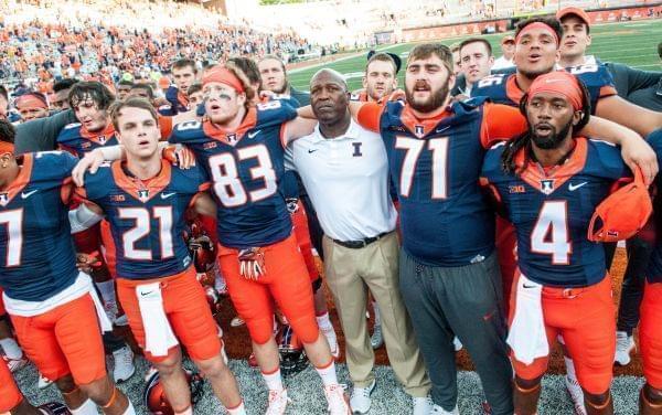 Illinois head coach Lovie Smith, center, sings the alma mater with the team after Illinois defeated Murray State 52-3 in an NCAA college football game Saturday, Sept. 3, 2016 at Memorial Stadium in Champaign.