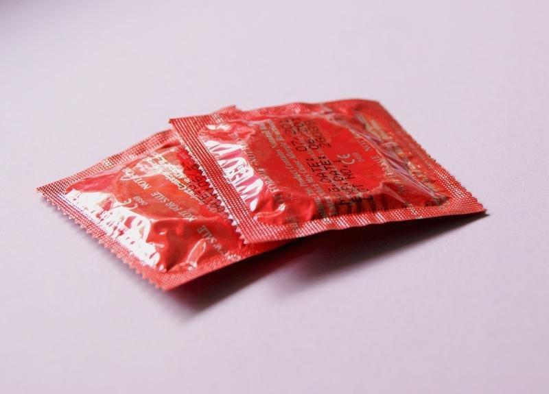 Two condoms in wrappers