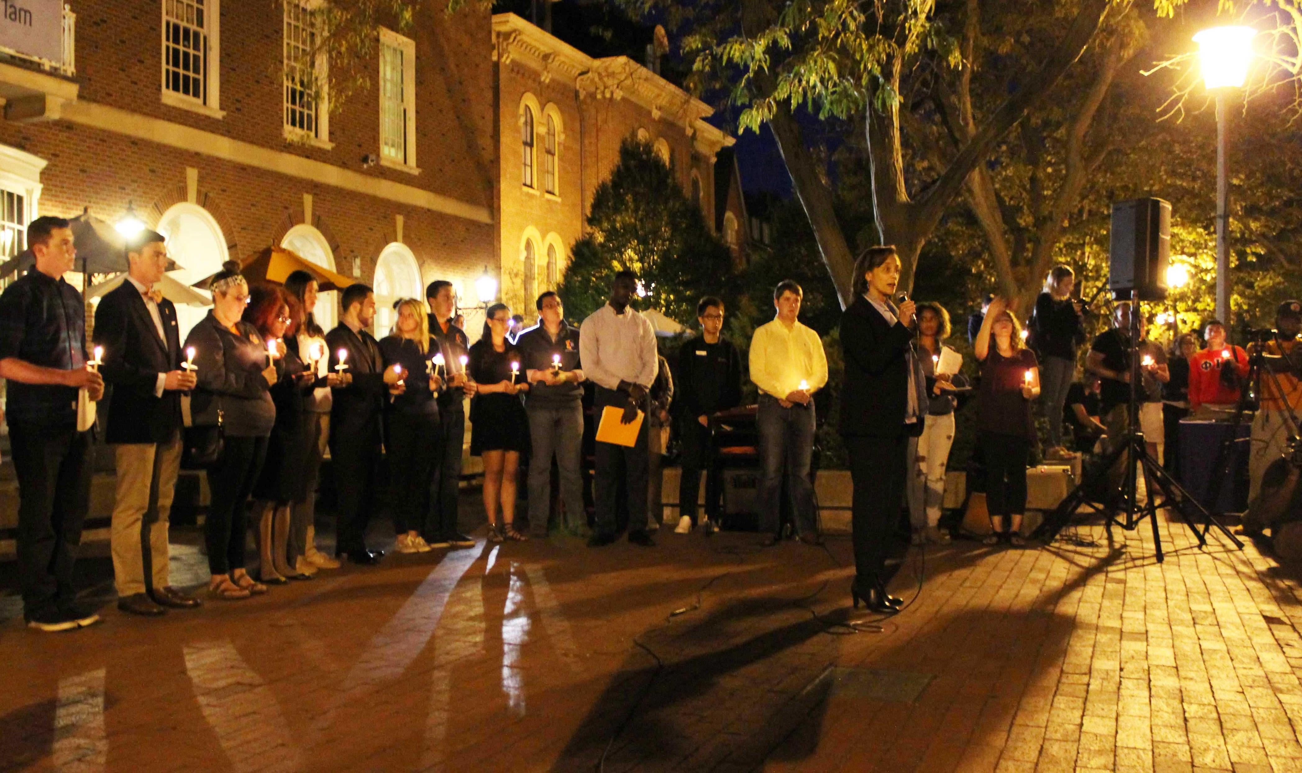 UI Counseling Center DIrector Carla McCowan addresses a crowd at the Urbana campus Quad Tuesday,