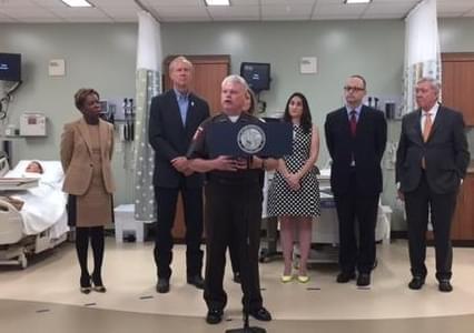 Sangamon County Sheriff Wes Barr joins Gov. Bruce Rauner, and other officials in promoting Illinois' attempt to expand services available to Medicaid recipients.
