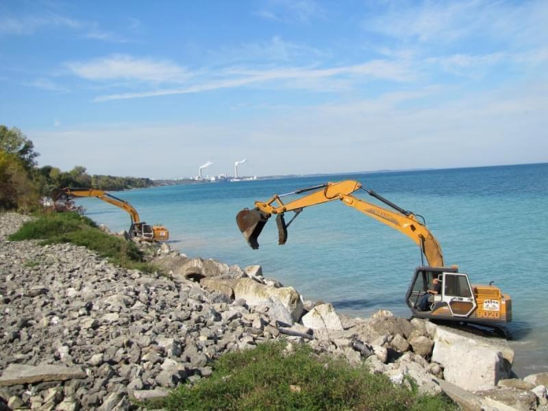 Heavy machinery used to slow erosion along Lake Michigan in southern Wisconsin.