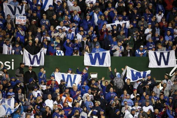 Chicago Cubs fans cheer after Game 5 of the World Series between the Chicago Cubs and the Cleveland Indians, Sunday, Oct. 30, 2016, in Chicago. The Cubs won 3-2 as the Indians lead the series 3-2. 