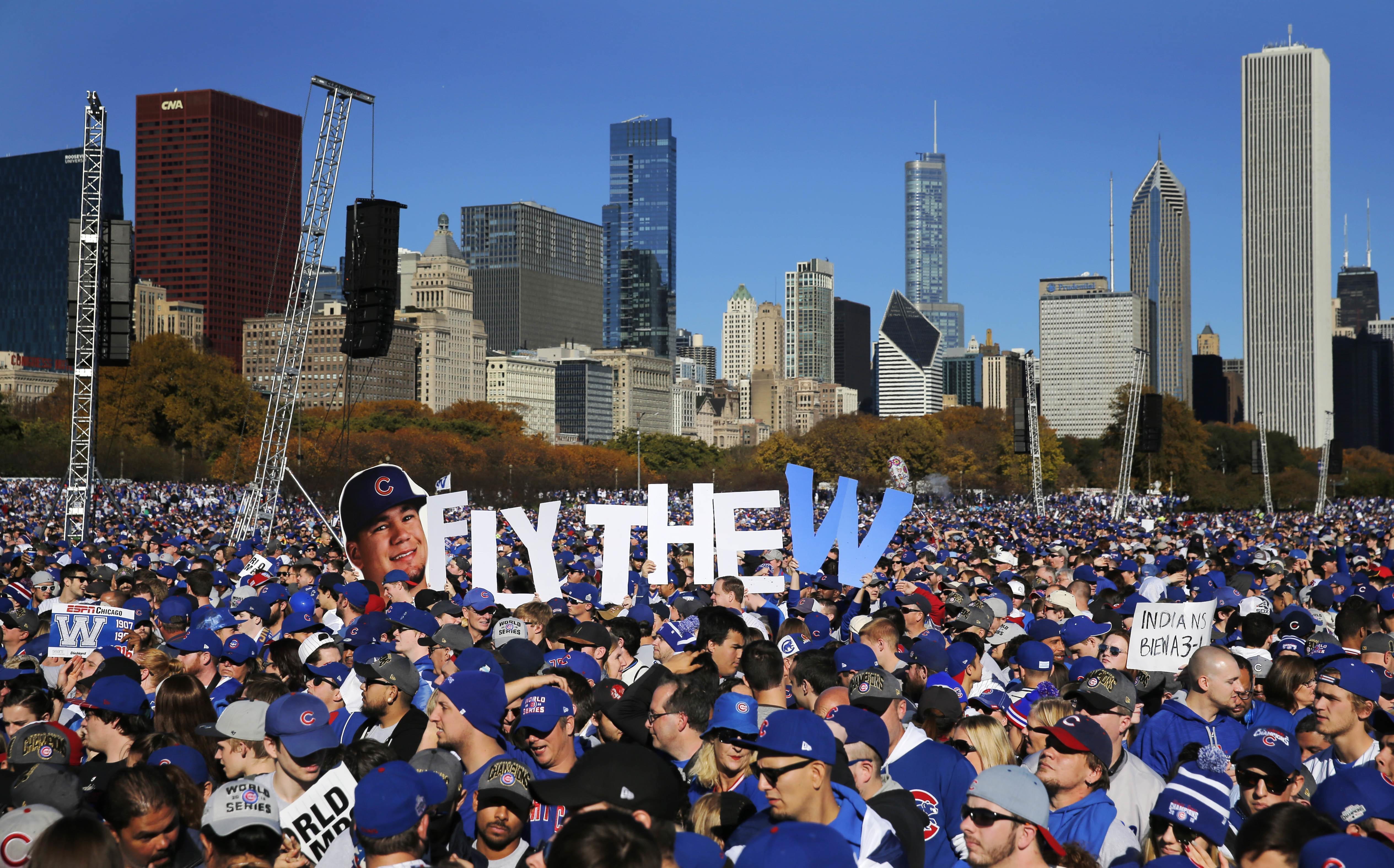 Chicago Cubs fans celebrate during a rally in Grant Park honoring the World Series baseball champions Friday, Nov. 4, 2016, in Chicago's Grant Park.