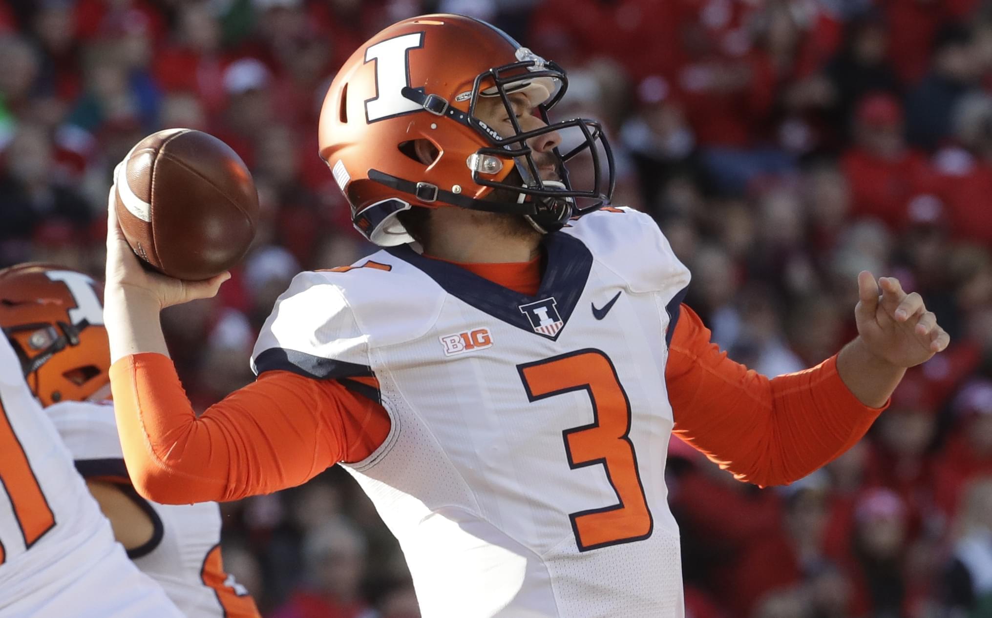 Illinois quarterback Jeff George Jr. throws during the first half of an NCAA college football game against Wisconsin Saturday in Madison, Wis.