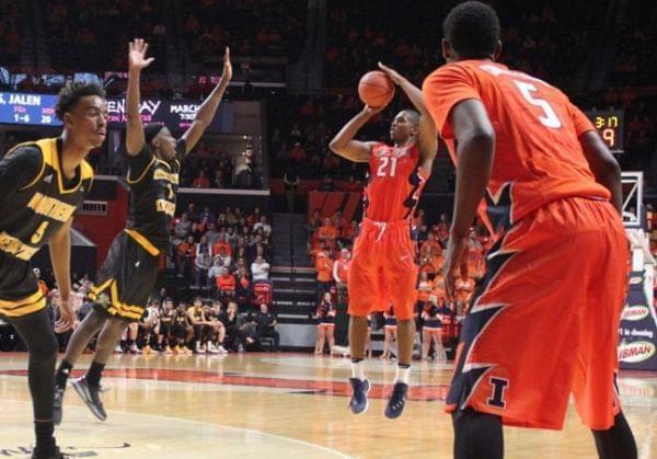 Malcom Hill fires a three-pointer for the Illini. 