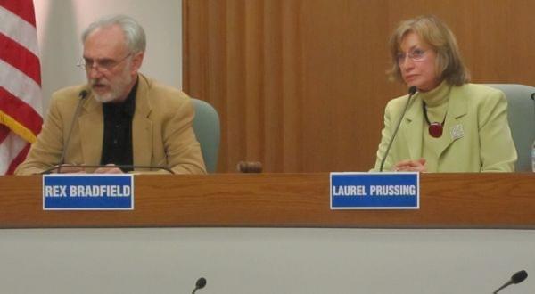 Bradfield debates Urbana Mayor Laurel Prussing in March 2013 at the Champaign City Building. 