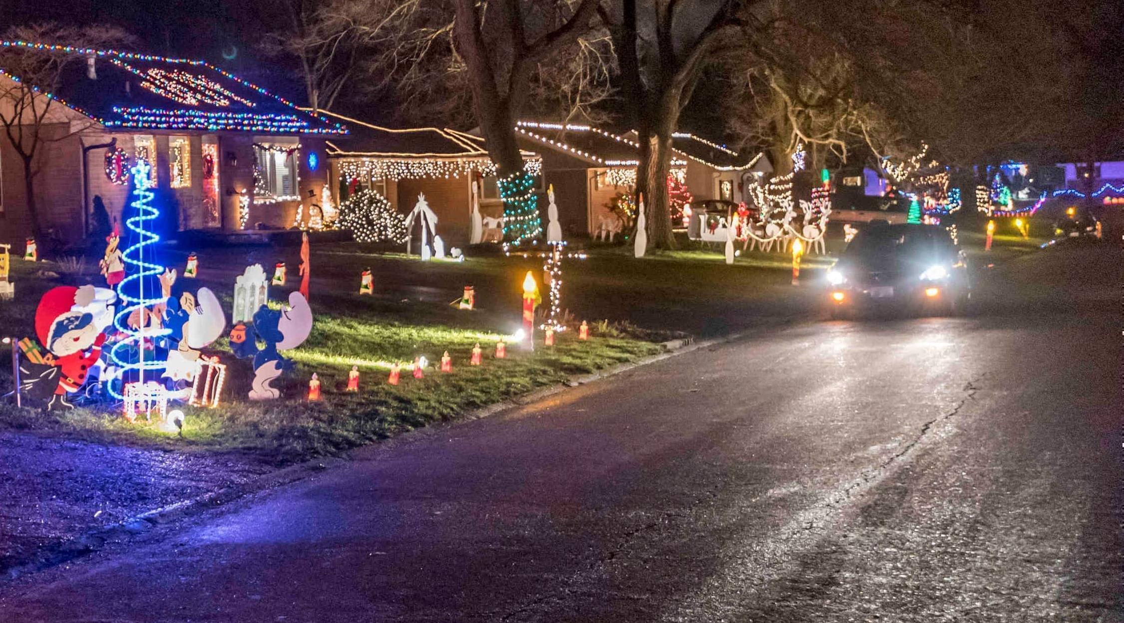 Homes in one east Urbana neighborhood celebrate the holidays along the route known as Candlestick Lane in 2015.