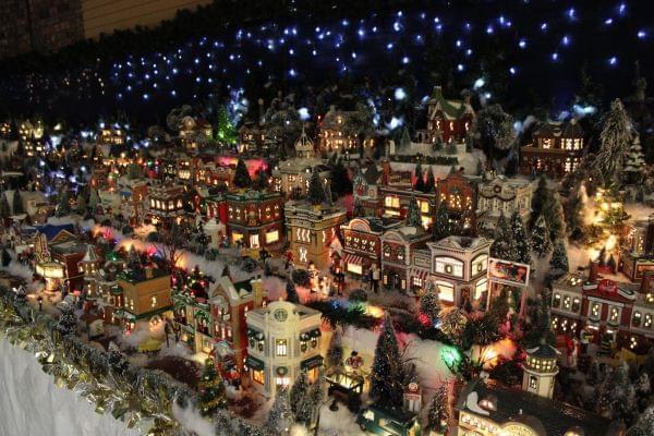 Roberta Morris' creation, the tiny village of 500 pieces on display through New Year's Day at Urbana's Lincoln Square Mall.