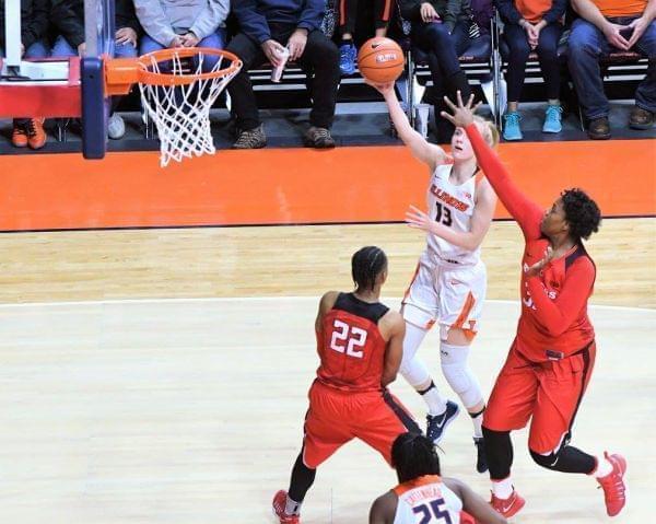 Petra Holešínská shoots over two Rutgers defenders in a 78-41 win.
