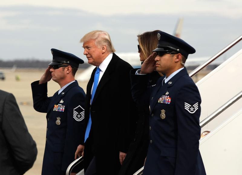 President-elect Donald Trump and his wife Melania arrive at Andrews Air Force Base, Md., Thursday, Jan. 19, 2017, in advance of Friday's inauguration. 