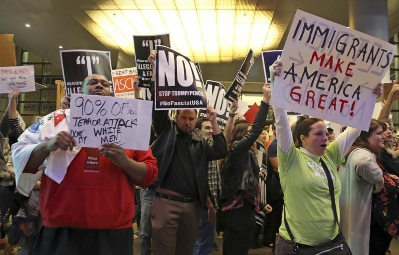 People opposed to President Donald Trump's executive order barring entry to the U.S. by Muslims from certain countries demonstrate at the Tom Bradley International Terminal at Los Angeles International Airport Saturday, Jan. 28, 2017