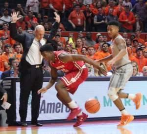 Illini coach John Groce avoids contact with Wisconsin&#039;s Nigel Hayes, Tuesday night in Champaign