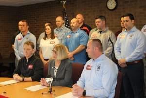 Urbana Alderwoman Diane Marlin meets with the city's local police and firefighters unions at the Illinois Law Enforcement Alarm System Building in Urbana Monday.