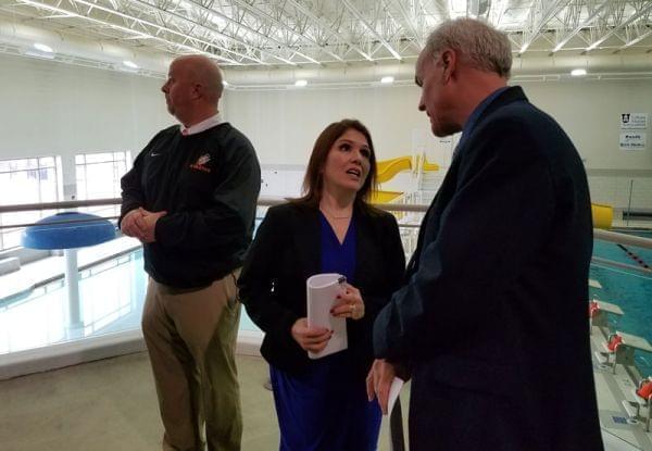 Lt. Gov. Evelyn Sanguinetti talks to Urbana Park District Executive Director Tim Bartlett during a stop at the Urbana Indoor Aquatic Center on Tuesday