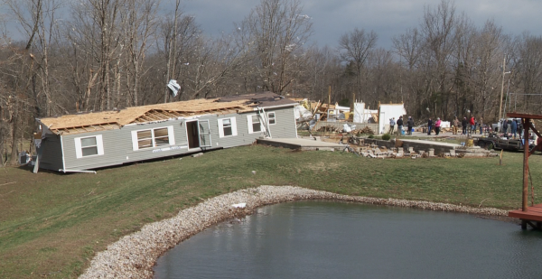 Wreckage of a house moved off of its foundation by a tornado in rural Jackson County.
