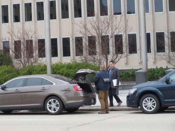 "At least a dozen cars and several dozen agents were visible along Adams Street during the late morning and early afternoon hours." -WCBU