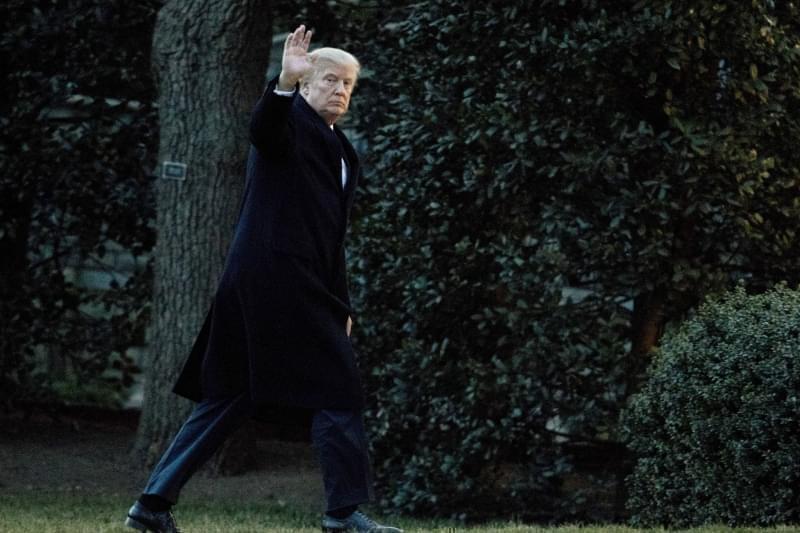 President Donald Trump waves as he arrives at the White House in Washington, Sunday, March 5, 2017, from a trip to Florida.