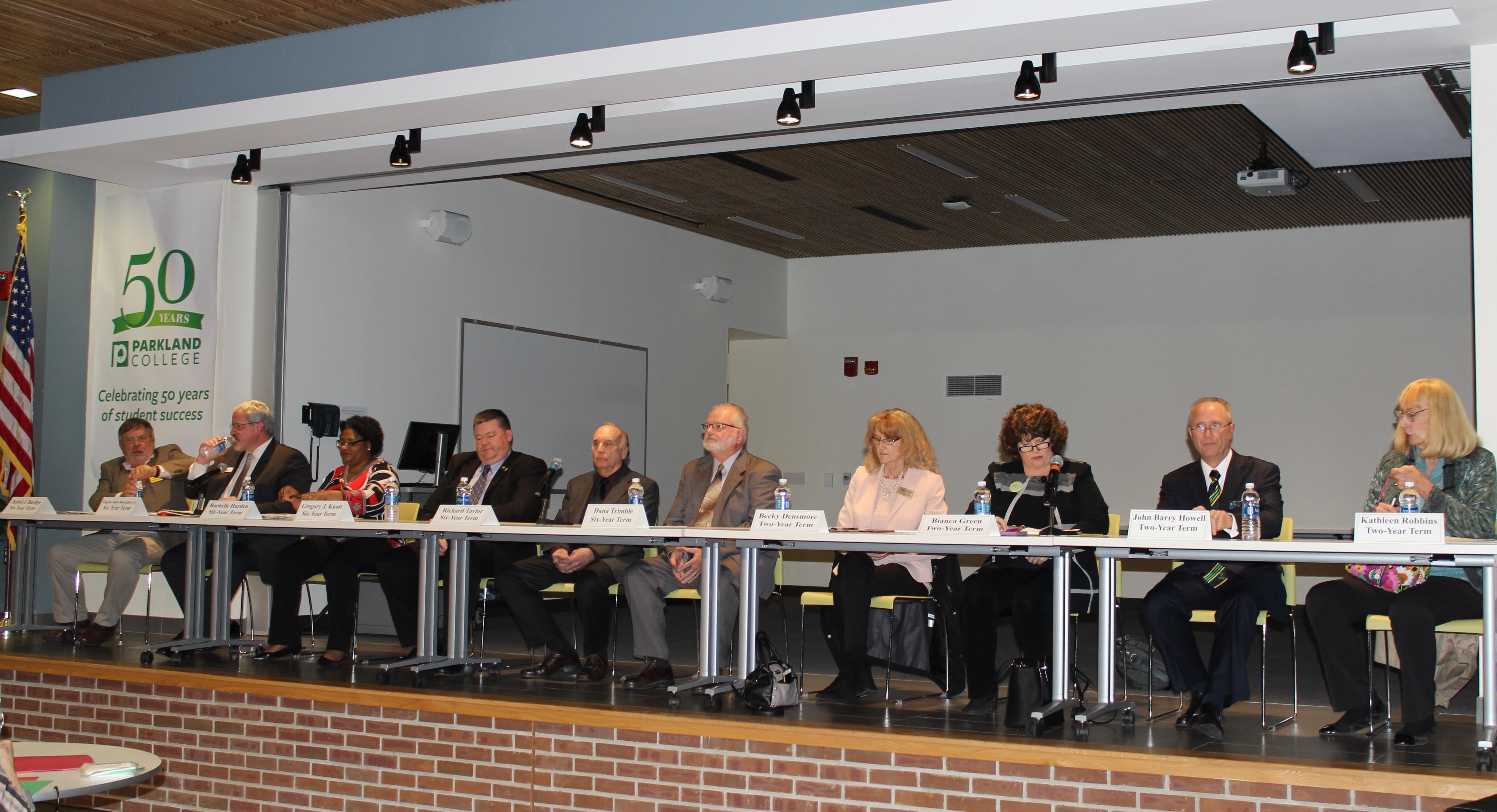 Candidates for Parkland College's Board of Trustees gather in the Student Union cafeteria for Monday's debate.
