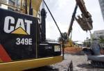 Last week, Caterpillar's Peoria HQ was raided by federal agents. 