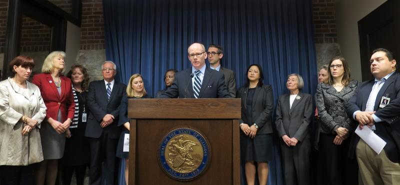 Sen. Don Harmon, at podium, was joined by other Democratic legislators to discuss the "Comeback Agenda."