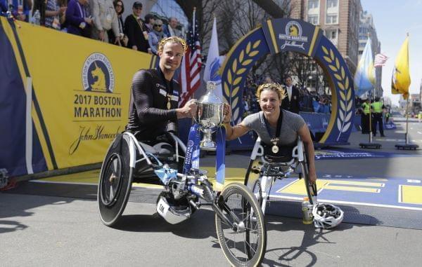 Boston Marathon wheelchair division winners Manuela Schar and Marcel Hug, both of Switzerland.