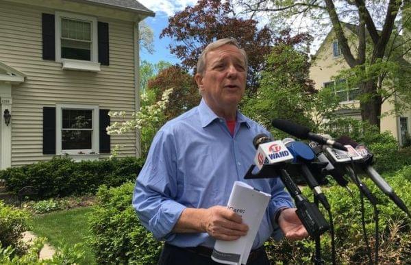 U.S. Sen. Dick Durbin speaks with reporters outside his home in Springfield, Illinois on Sunday, May 7, 2017.