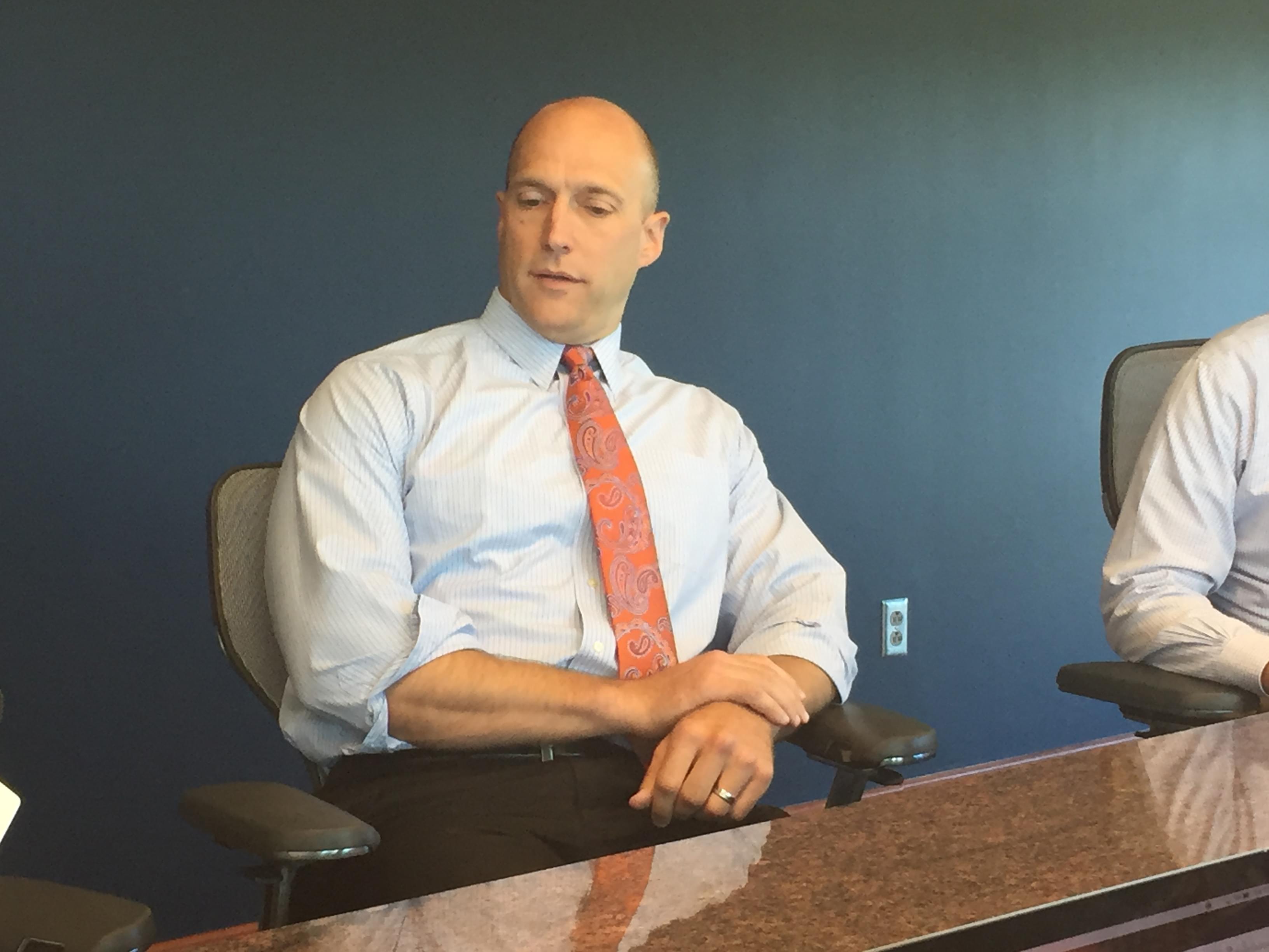 University of Illinois Athletic Director Josh Whitman talks with reporters Tuesday at the Bielfeldt Athletics Administration Building in Champaign.