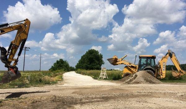 Construction workers work west of St. Joseph on the first segment of Kickapoo Rail Trail.