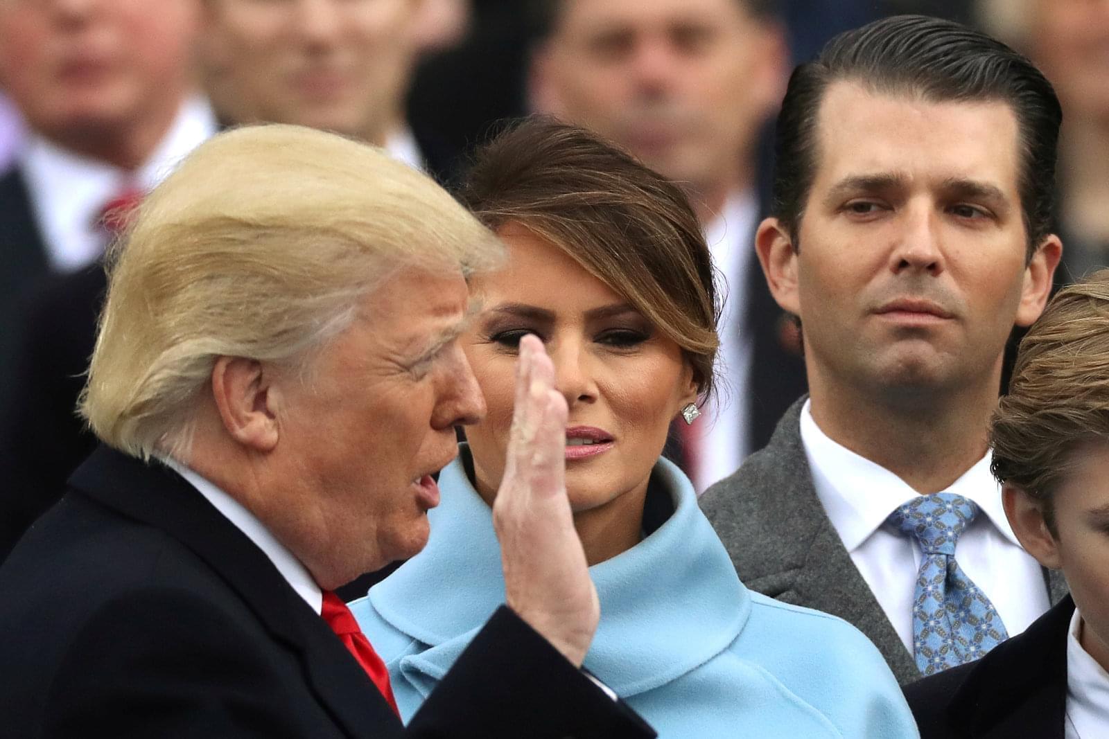 Donald Trump Jr., far right during his father's inauguration, has released an email exchange about setting up a meeting in 2016 with a Russian lawyer who he is told has damaging information about Hillary Clinton. 