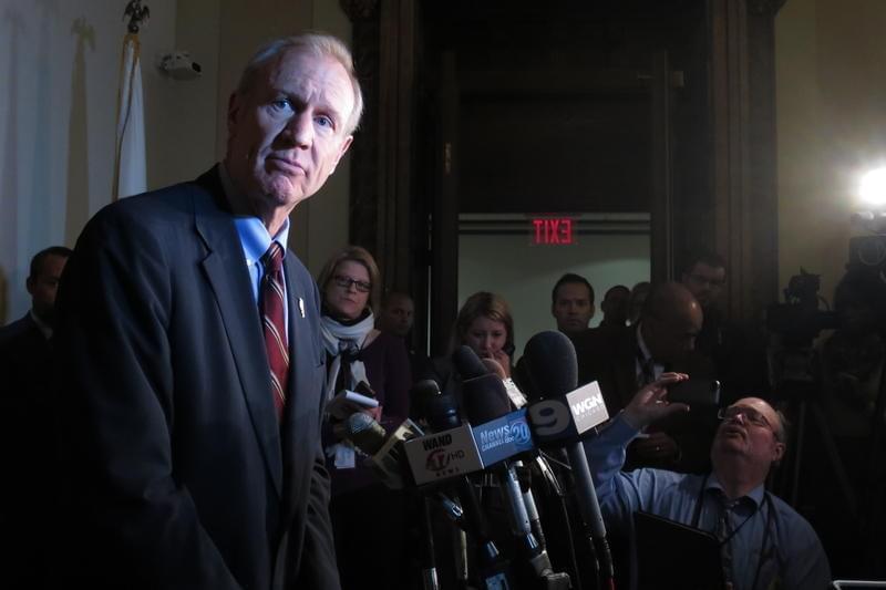 Governor Bruce Rauner taking questions from the media.