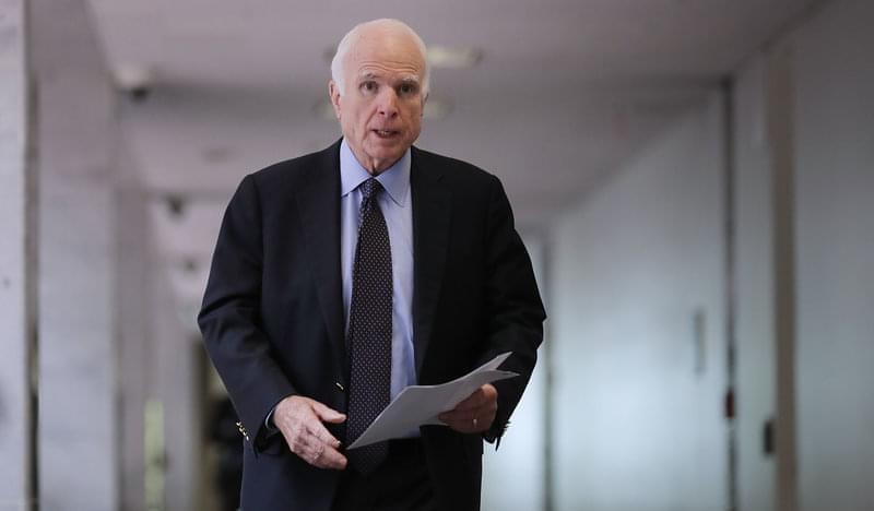 Senate Intelligence Committee member Sen. John McCain, R-Ariz., heads into a closed-door committee meeting with Director of National Intelligence Dan Coats on June 15 in Washington, D.C.