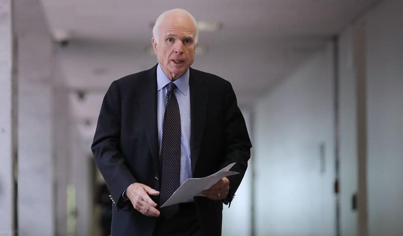 Senate Intelligence Committee member Sen. John McCain, R-Ariz., heads into a closed-door committee meeting with Director of National Intelligence Dan Coats on June 15 in Washington, D.C. 