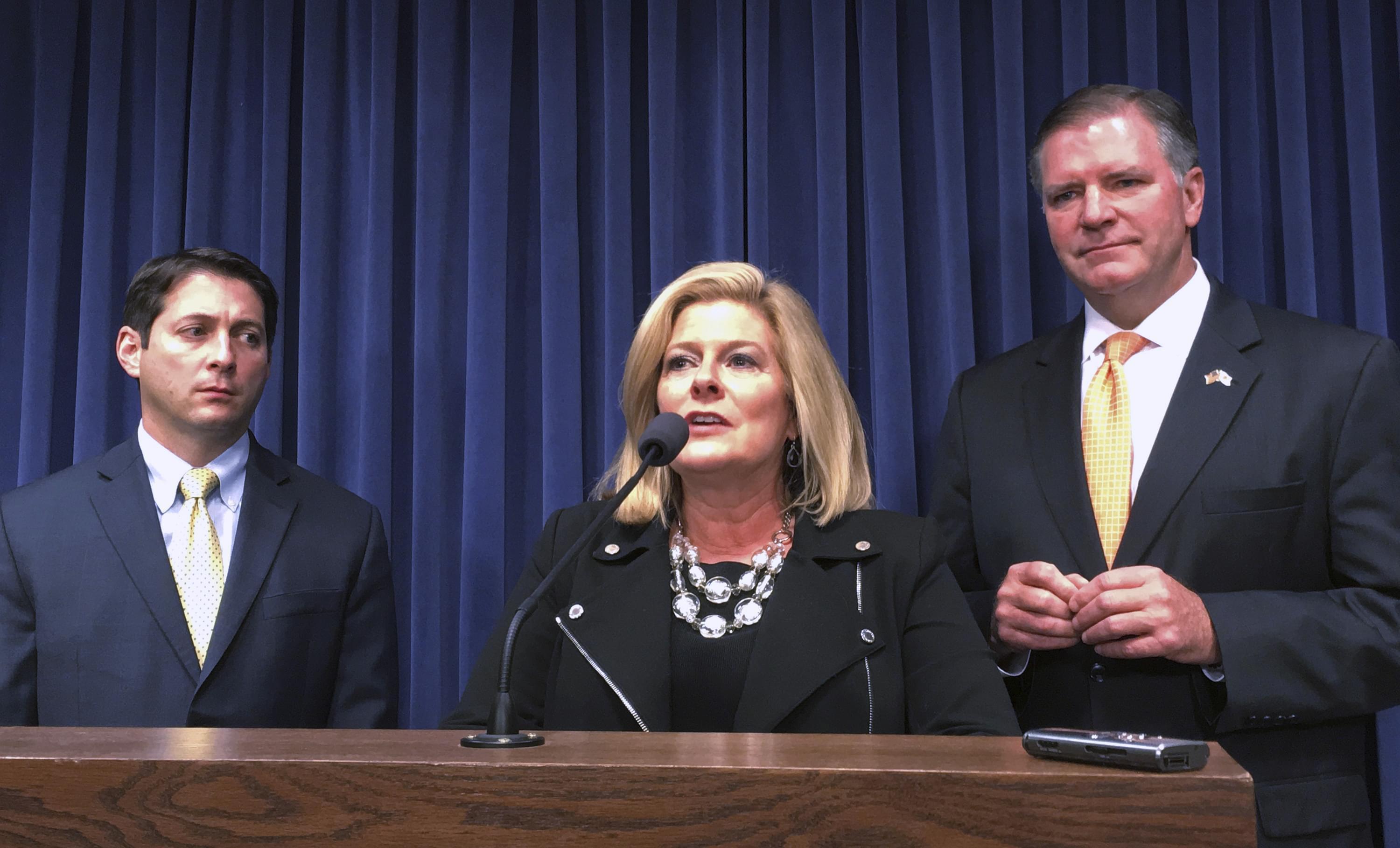 Sen. Karen McConnaughay, R-St. Charles, speaks at a news conference accompanied by Sen. Jason Barickman, R-Bloomington, right, and Sen. Bill Brady, R-Bloomington, Wednesday, May 17, 2017, in Springfield, Ill.