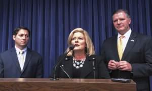 Sen. Karen McConnaughay, R-St. Charles, speaks at a news conference accompanied by Sen. Jason Barickman, R-Bloomington, right, and Sen. Bill Brady, R-Bloomington, Wednesday, May 17, 2017, in Springfield, Ill. 
