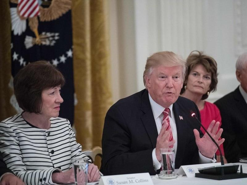 President Trump flanked by Sens. Susan Collins, of Maine, (L) and Lisa Murkowski, of Alaska, (R) as GOP senators meet with Trump to discuss the health care bill at the White House on June 27, 2017. 