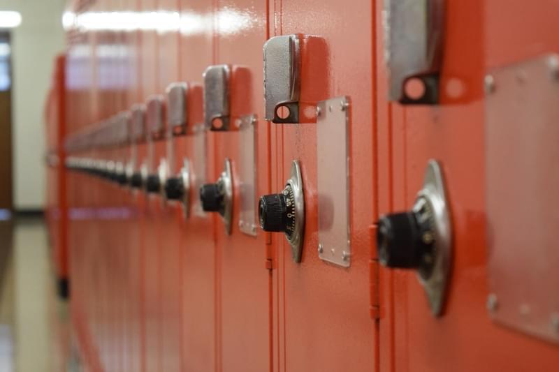 Lockers in a school hallway.