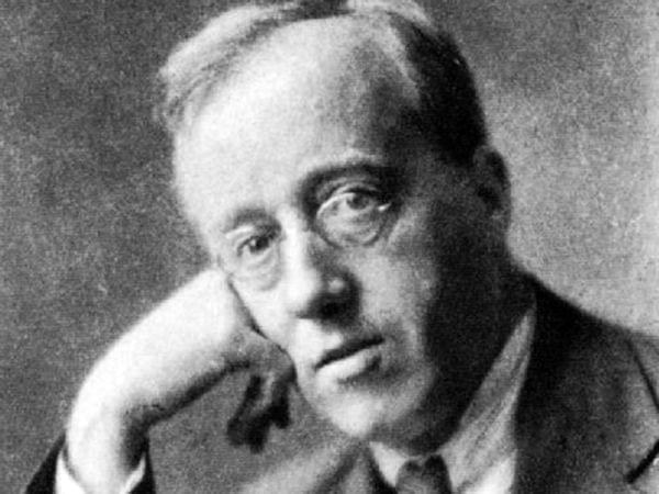 Gustav Holst, c.&thinsp;1921 (photograph by Herbert Lambert)