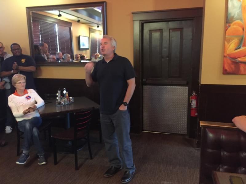 Democratic candidate for governor Chris Kennedy speaks to Champaign County Democrats at Jupiter's in Champaign on Saturday August 26.