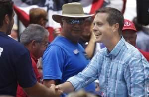U.S. Rep. Rodney Davis shakes hands with people attending the Republican Day rally at the Illinois State Fair in Springfield in 2014.