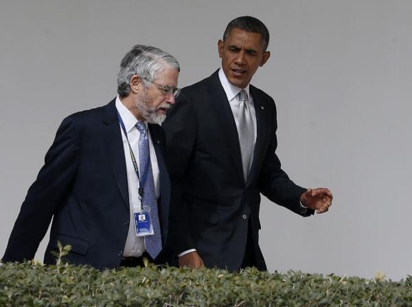 In this file photo, then-President Barack Obama walks with John P. Holdren, Assistant to the President for Science and Technology and Director of the White House Office of Science and Technology Policy, at the White House in Washington, Friday, March